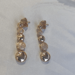 Brinco estilo bolinhas lisas e cravejado com Zircônias